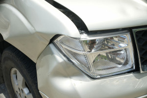 A Dent On The Right Front Of A Pickup Truck (damage From Crash A