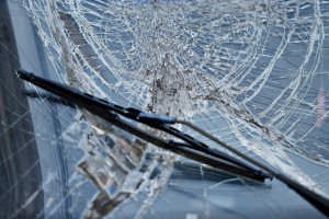 Detail shot with a broken car windshield after accident
