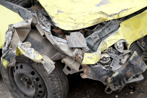 Traffic Accident. Yellow Crashed Car