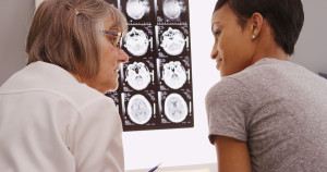 Senior Female Doctor Reviewing Xray Results With Patient